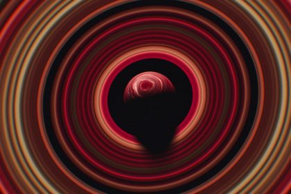 Representação abstrata de um sistema planetário em formação, com anéis luminosos ao redor de um ponto central
